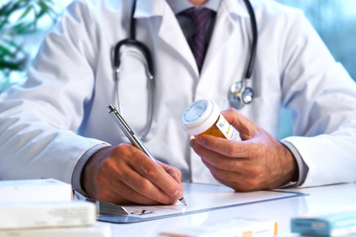 Doctor,Writing,Out,Rx,Prescription,Selective,Focus